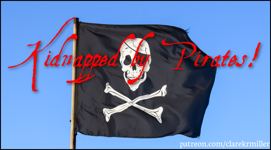 hand behind barbed wirewith dark background